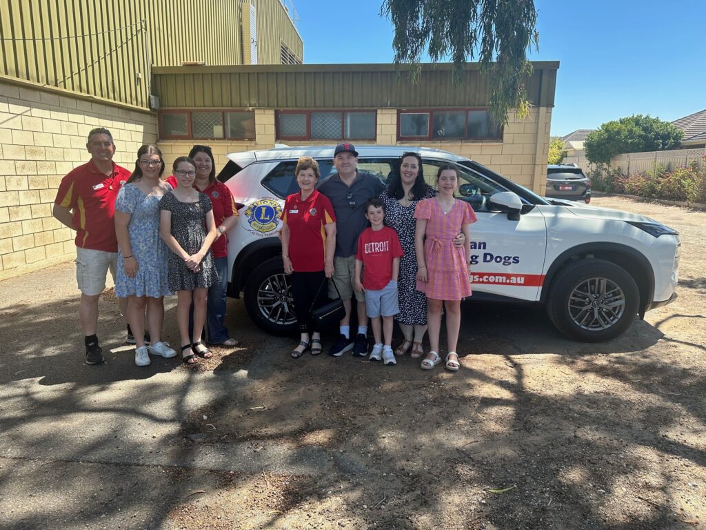 Australian Lions Hearing Dogs and Tony Pederick's family